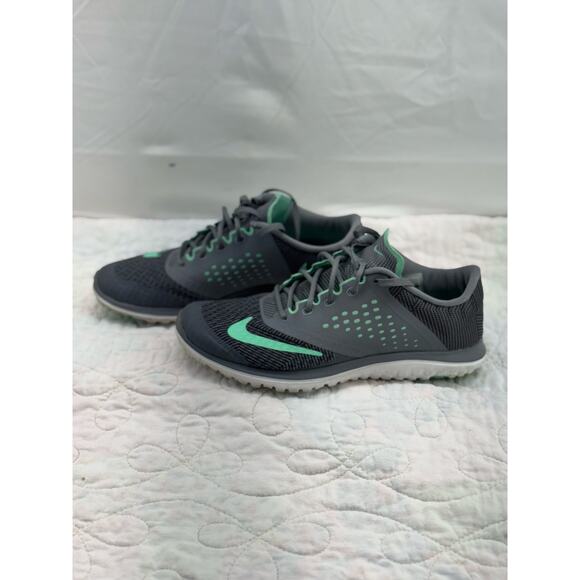 Gray and teal Nike women’s 7.5 - Picture 2 of 9